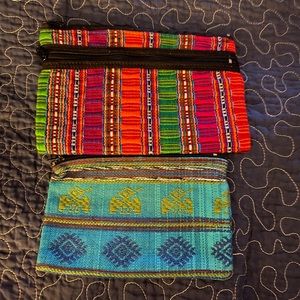 2 Colorful pouches can be used as a wallet or cosmetic bags.